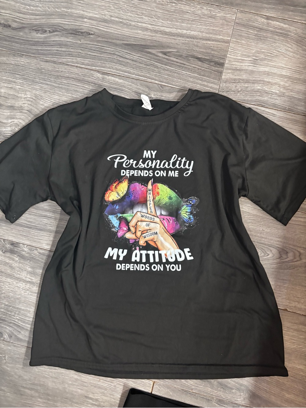 Black Short-Sleeve Graphic Tee with Colorful Butterfly Accent